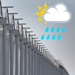 Serres avec soleil derrière un nuage et des gouttes d'eau